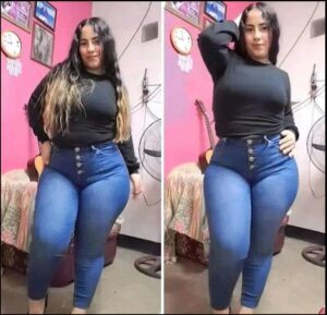 two women are posing for a picture in a room