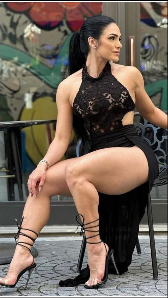 a woman in a black dress and a black skirt