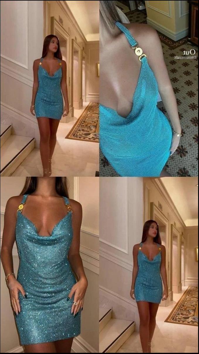 two women are in a room with a wall