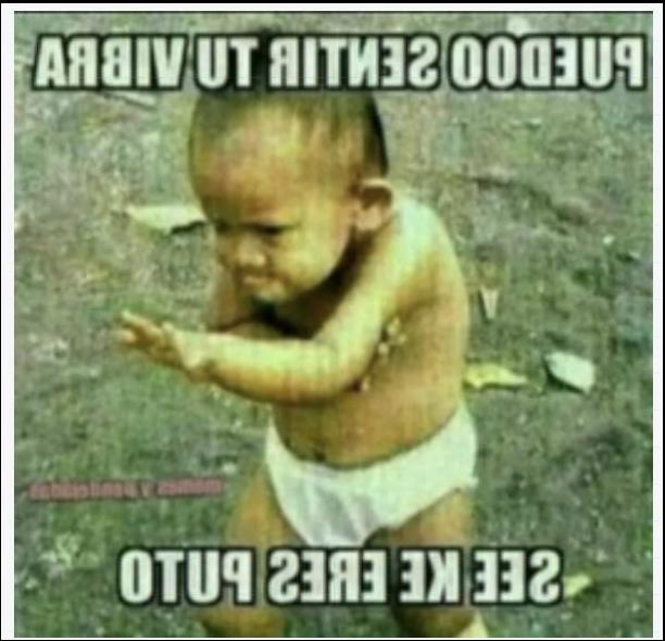 a young boy is holding a paper towel