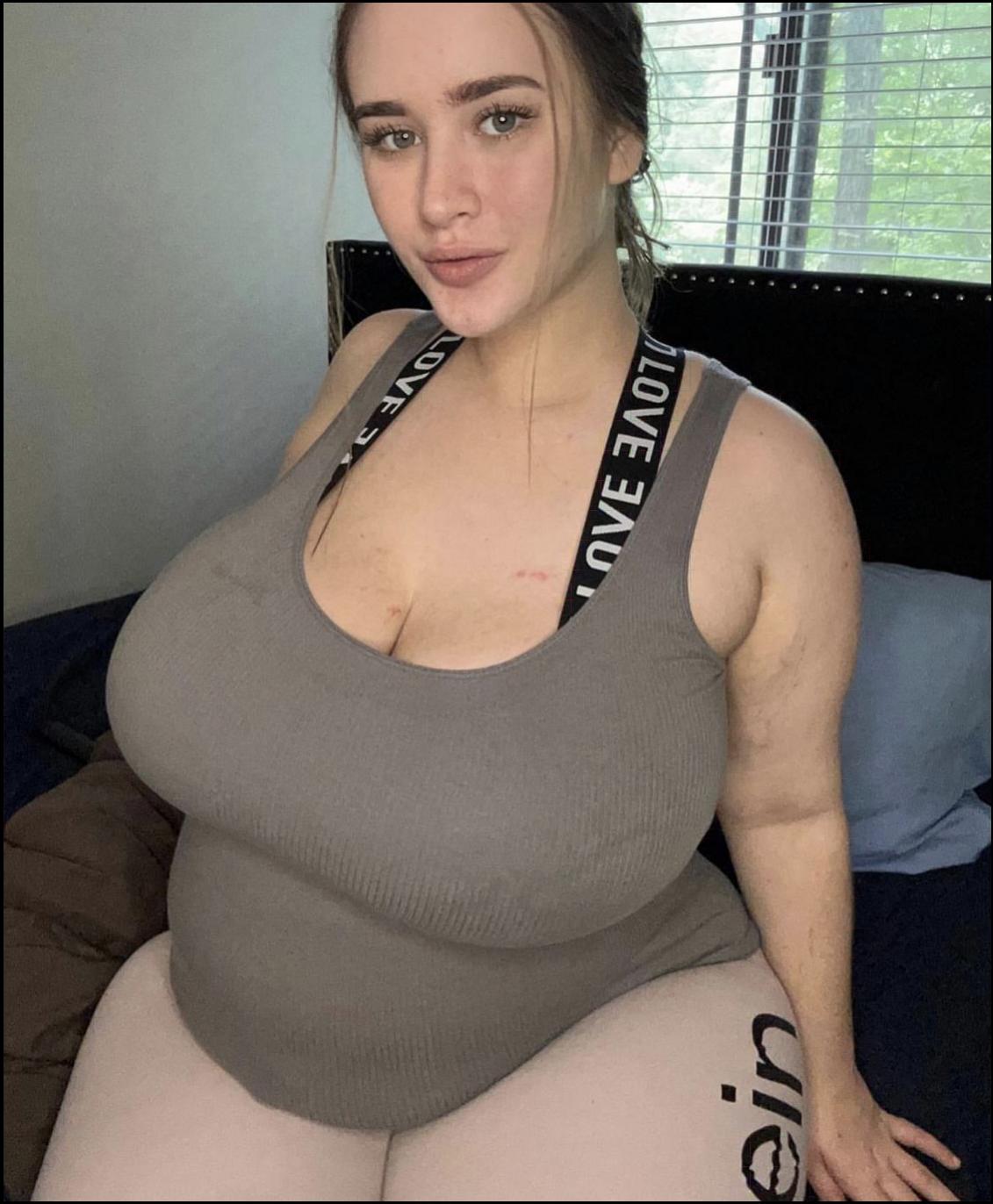 a woman in a black shirt and a black tie