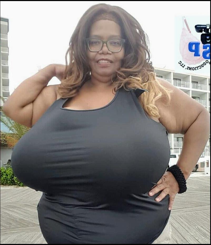 a woman in a black tank top and a black and white tank top