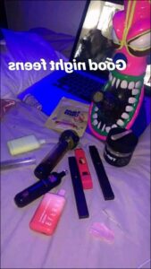 a pair of scissors and a pair of scissors on a bed