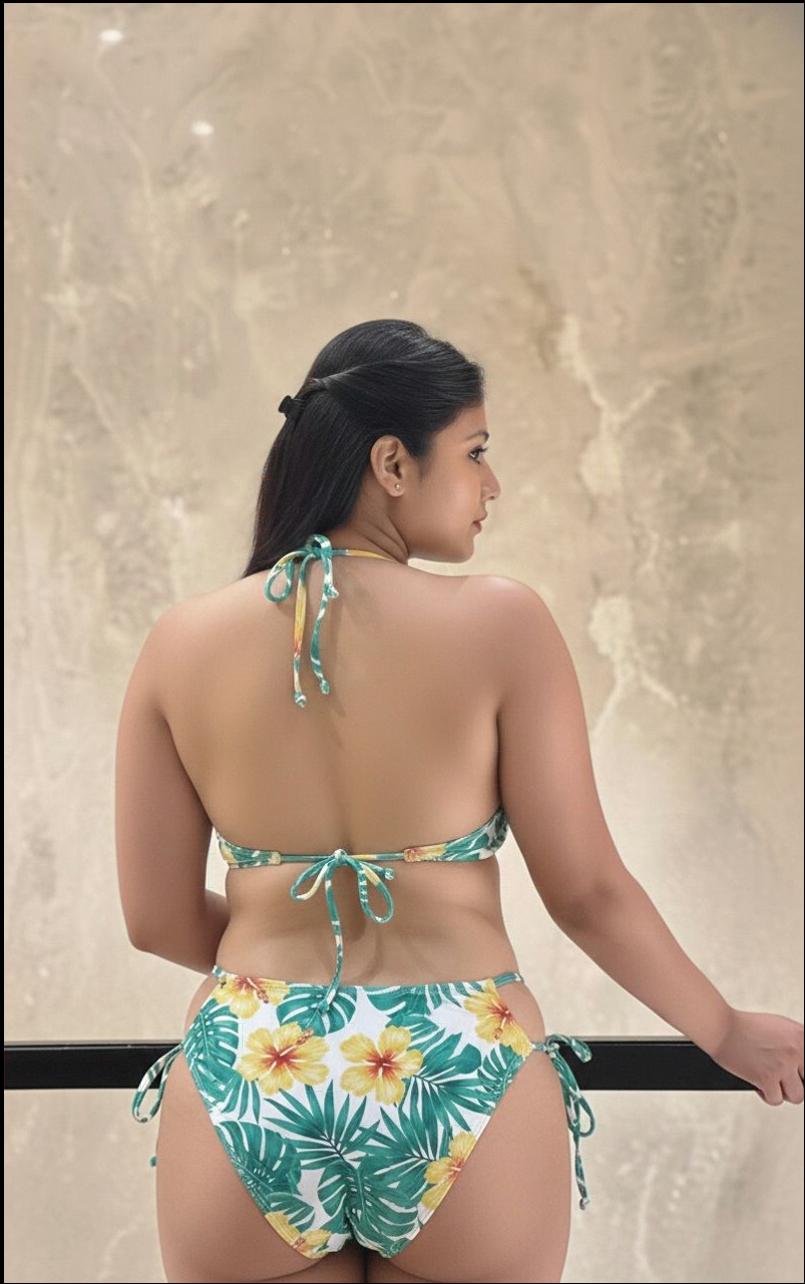 a woman in a bikini on a beach