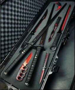 a knife and some scissors on a table