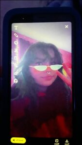 a person with a cat on a tv