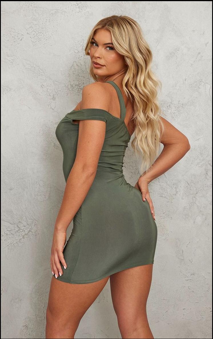 a woman in a black dress and a black skirt