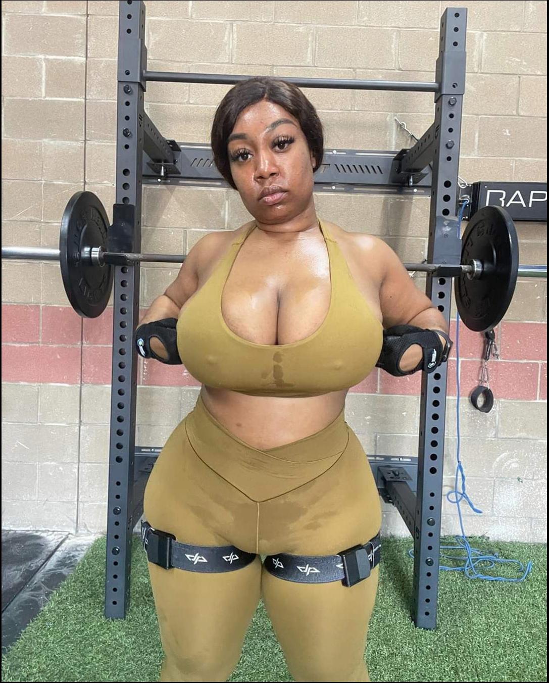 a woman in a bikini posing for a picture