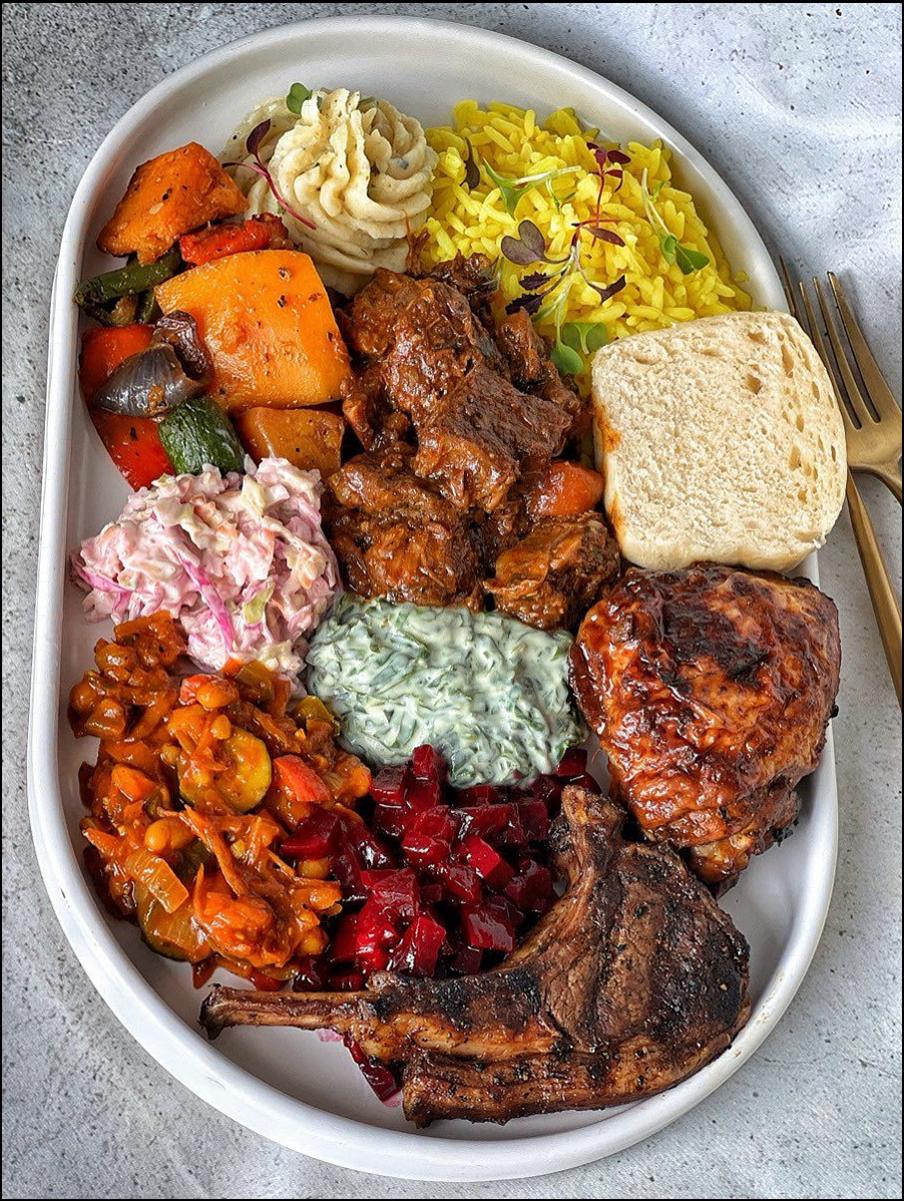 a plate of food with a bowl of vegetables