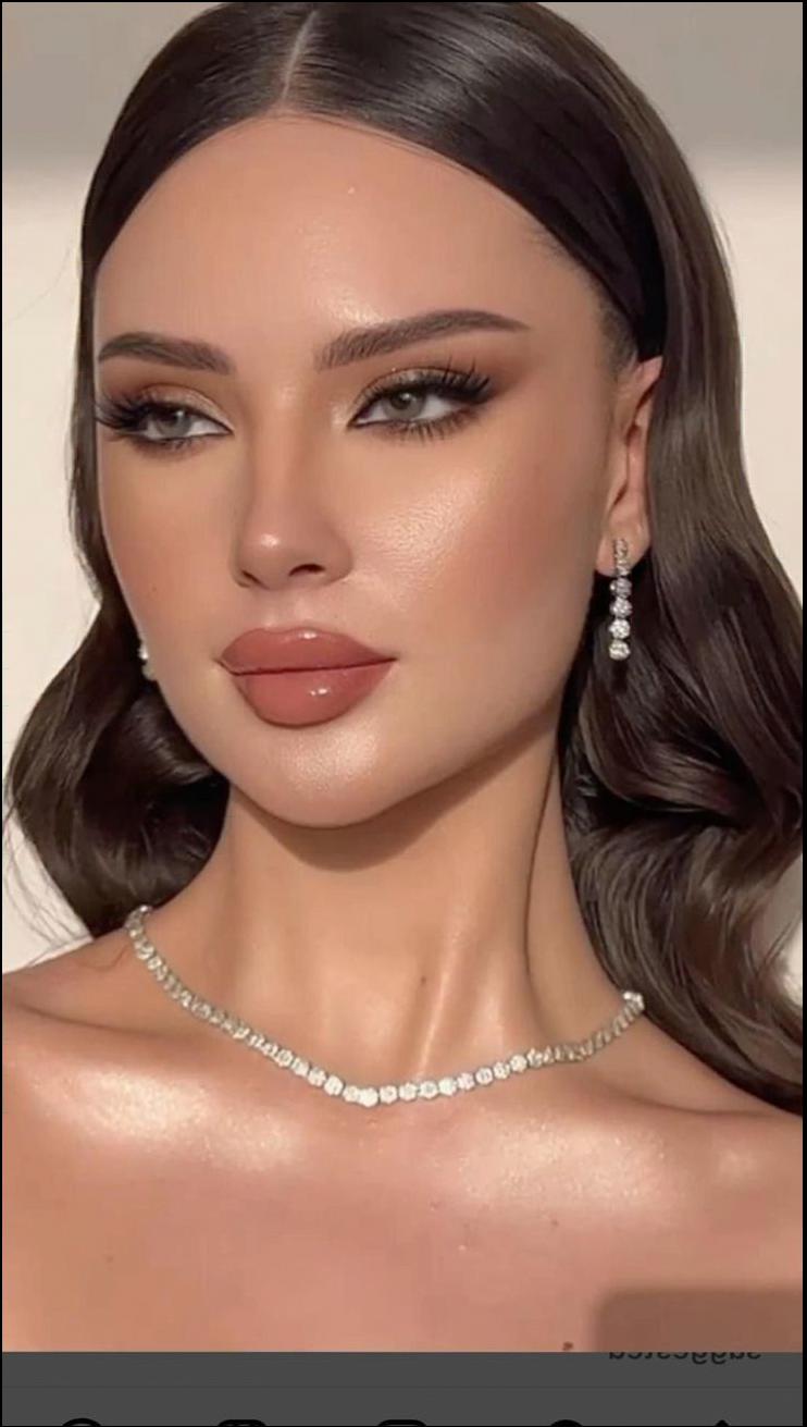 a woman in a red dress with a blue flower