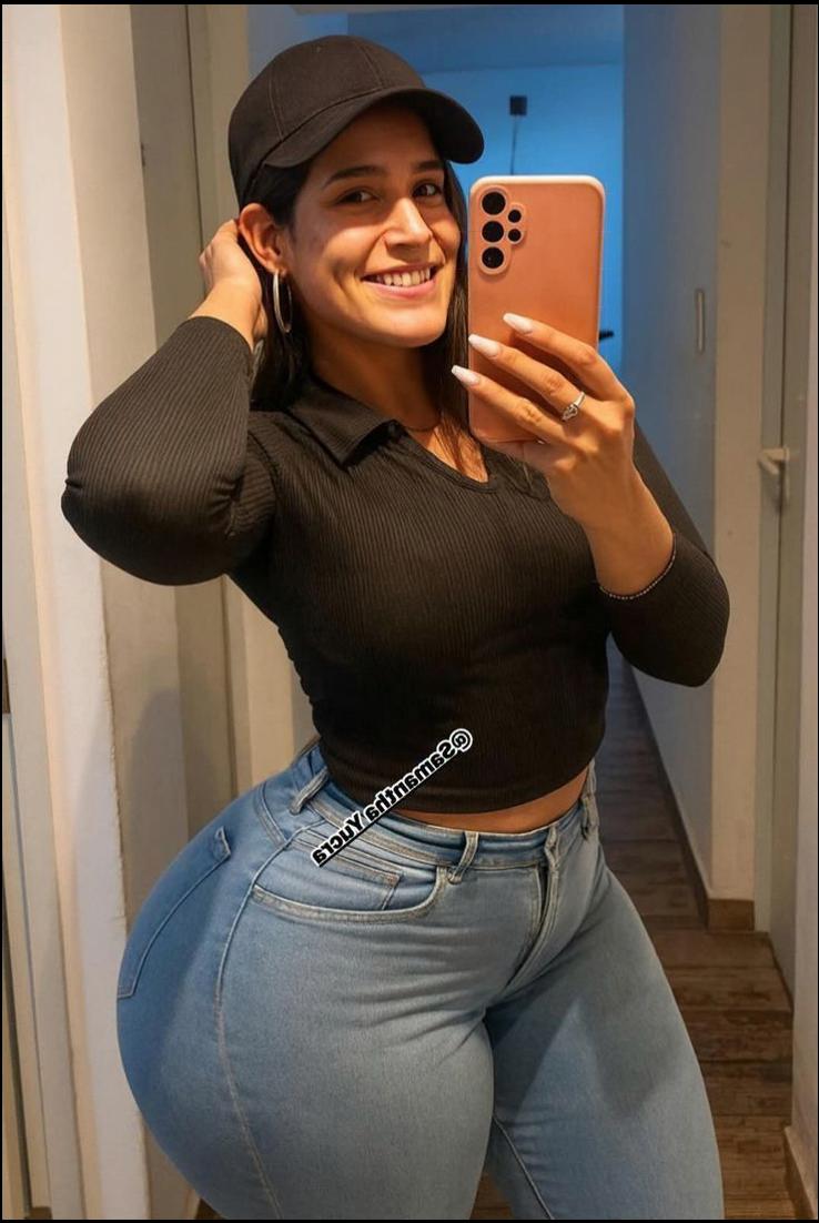 a woman wearing a blue shirt and a black skirt