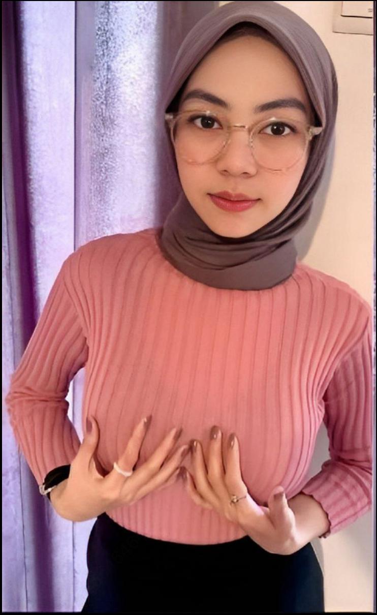 a woman is posing for a picture with a flower